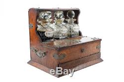 19th century Antique Captain Oak Tantalus with3 Cut Glass decanters