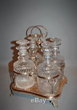 Antique A Good Georgian Set of 4Decanters in their Original Stand