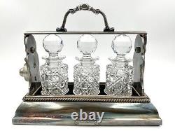 Antique English Tantalus By Betjemann, Cut Glass Decanters & Silverplate Holder