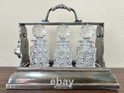 Antique English Tantalus By Betjemann, Cut Glass Decanters & Silverplate Holder