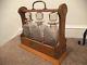 Antique Oak & Brass Tantalus With Three Blown And Hand Cut Glass Decanter