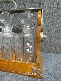 Antique Oak Cut glass bottles Tantalus Betjemann's Patent London