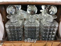 Antique Oak Three Bottle Tantalus Games Compendium Decanters & Glasses