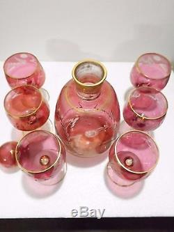 Antique ruby cut glass decanter with 6 glasses
