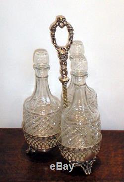 Antique silver plated decanter holder, Mappin Bros and three cut glass decanters