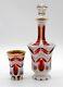 Bohemian Czech White Enameled Overlay Cut To Cranberry Decanter With Stopper & Cup