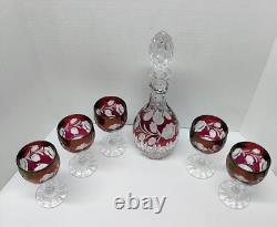 Cranberry red, cut to clear crystal decanter with Stopper and Five wine glass