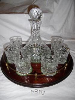 Crystal ships decanter with whisky glasses on galleried mahogany tray