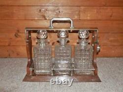 Edwardian Silver Plate Triple Tantalus with Three Crystal Cut Glass Decanters