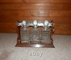 Edwardian Silver Plate Triple Tantalus with Three Crystal Cut Glass Decanters