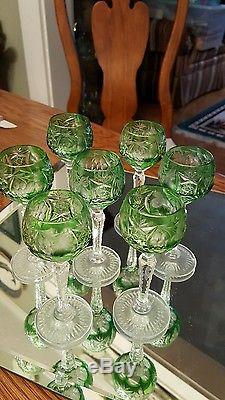 Emerald cut glass decanter and seven matching cordials