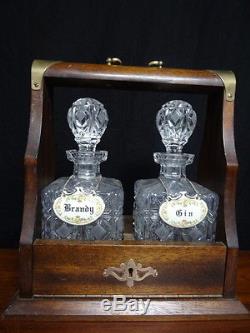 English Rock Crystal Tantalus Set 2 Decanters Porcelain Brandy & Gin Plaques