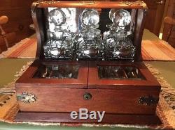 English Tantalis with Three Cut Glass Decanters