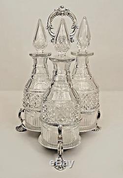 English Victorian Silverplate Tantalus Set with 3 Cut Crystal Decanters