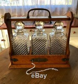English Victorian Tantalus With Three Cut Glass Decanters & Key Drop Front
