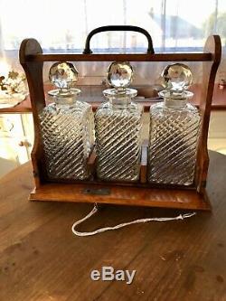 English Victorian Tantalus With Three Cut Glass Decanters & Key Drop Front