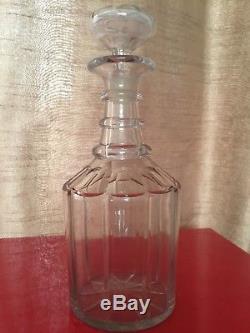 GEORGIAN THREE RING NECK DECANTER. Panel cut with star base