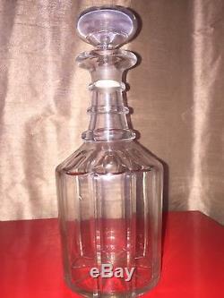 GEORGIAN THREE RING NECK DECANTER. Panel cut with star base