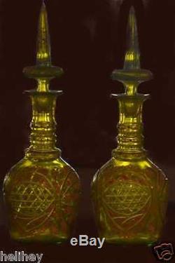 Magnificent pair of Bohemian hand cut and enameled glass decanter