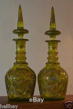 Magnificent pair of Bohemian hand cut and enameled green glass decanter