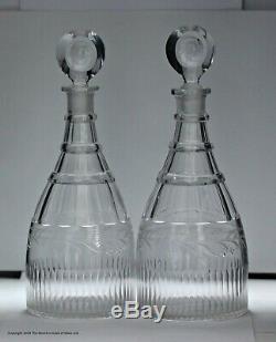 Pair of Georgian engraved and cut taper decanters