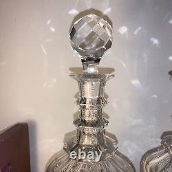 Pair of cut glass decanters with stoppers