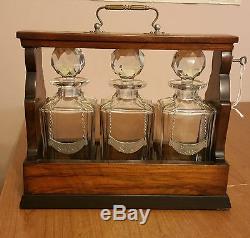Rare wood tantalus with 3 cut glass decanters, Daalderop pewter, working lock