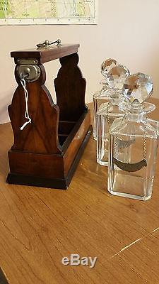 Rare wood tantalus with 3 cut glass decanters, Daalderop pewter, working lock