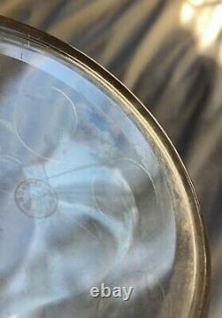 Saint Louis vintage crystal decanter. Cut vines around conical body. 13 1/2 h