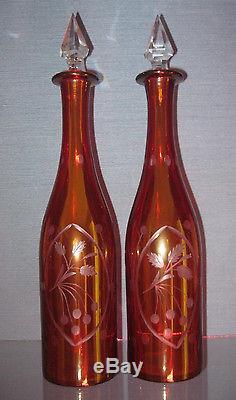 Set of 2 Vintage Cranberry Cut to Clear Glass Decanters with Diamond Cut Stoppers