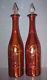 Set Of 2 Vintage Cranberry Cut To Clear Glass Decanters With Diamond Cut Stoppers
