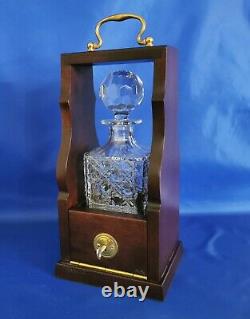 Single Mahogany Tantalus With Brass Fittings and 24% Cut Lead Crystal Decanter