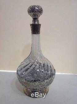 Tiffany cut crystal and silverplated decanter. Signed on base. 19th century