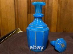 Translucent 4 piece set with decanter & 3 cups of gilded cut blue opaline glass