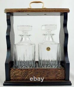 Two Decanter Lift Out Tantalus with Brass fittings and 2 Lead Crystal Decanters