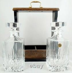 Two Decanter Lift Out Tantalus with Brass fittings and 2 Lead Crystal Decanters