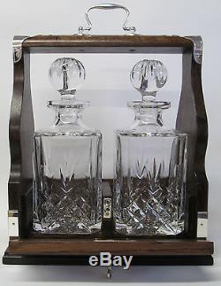 Two Decanter Tantalus In Solid Oak Frame With Silver Plated Fittings