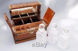 Victorian/Edwardian Carved Oak Games Tantalus with Three Decanters