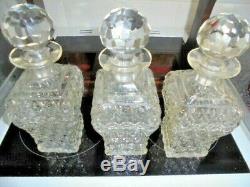 Victorian / edwardian tantalus decanter set