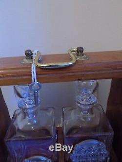 Vintage tantalus. Decanters good condition. With key